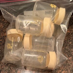 Medela Breast Milk Storage Bottles with Yellow Lids set of 6